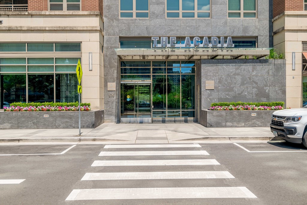 an empty parking lot in front of the building